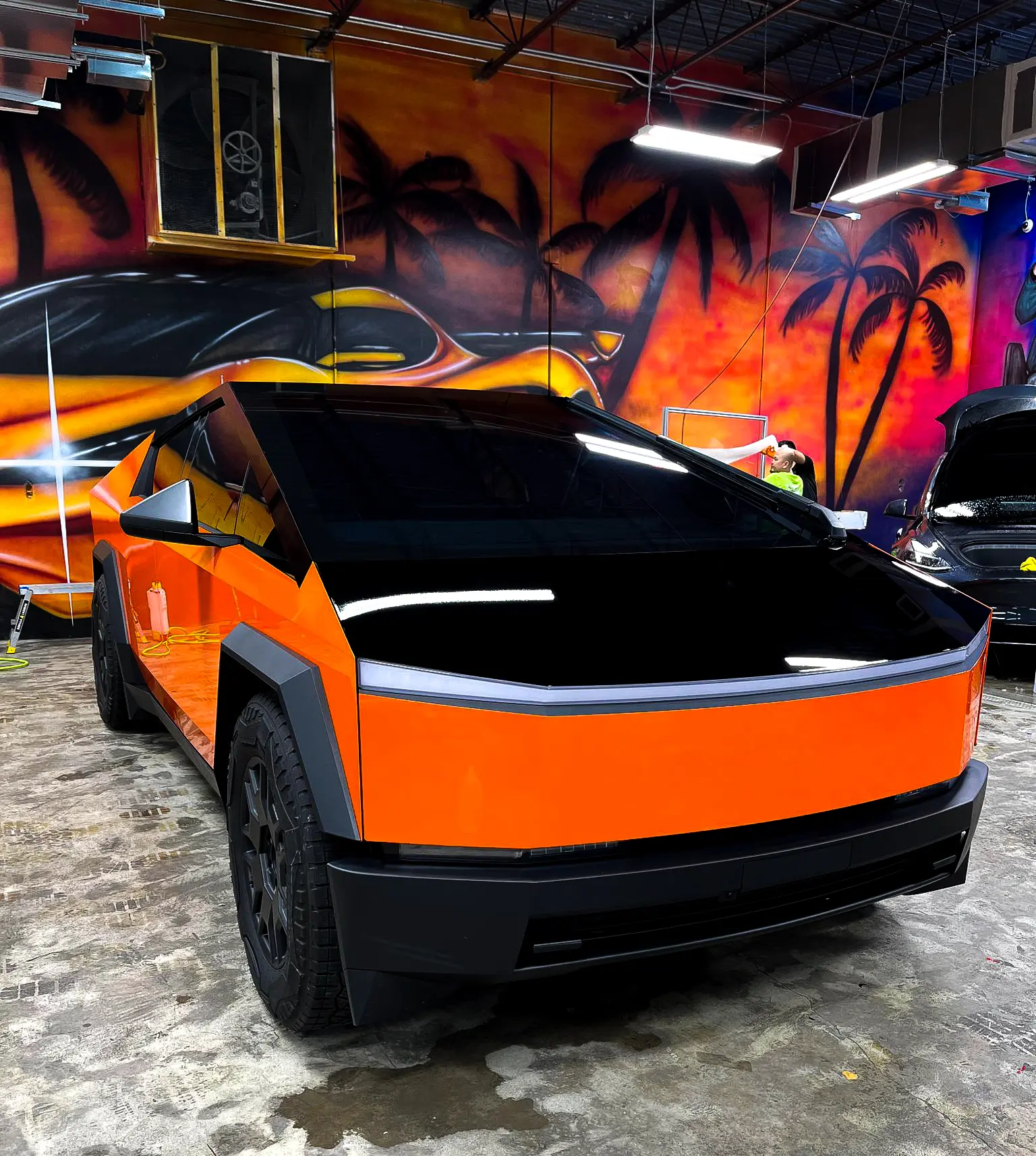 Orange-wrapped Tesla Cybertruck